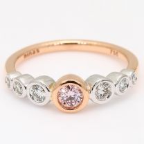 Atlantica Argyle pink and white diamond bezel ring