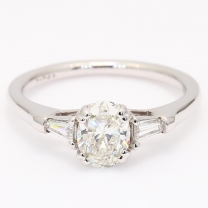 Daria oval and tapered baguette cut white diamond 3 stone engagment ring