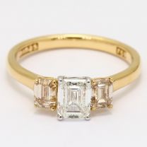 Dynasty emerald cut GIA certified champagne and white diamond three stone ring