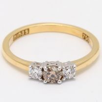 Triplet champagne and white diamond three stone ring