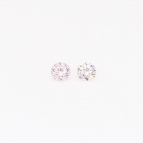 0.08 Total carat pair of round cut Argyle pink diamonds